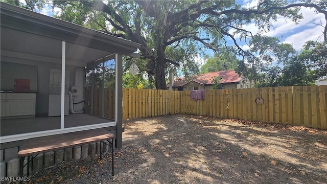 2357 Crawford St, Fort Myers, FL 33901 - view of yard featuring fence and a sunroom