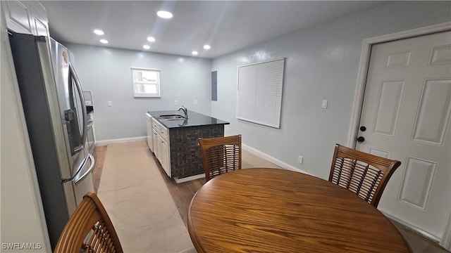 2357 Crawford St, Fort Myers, FL 33901 - dining area with light wood-type flooring, recessed lighting, and baseboards