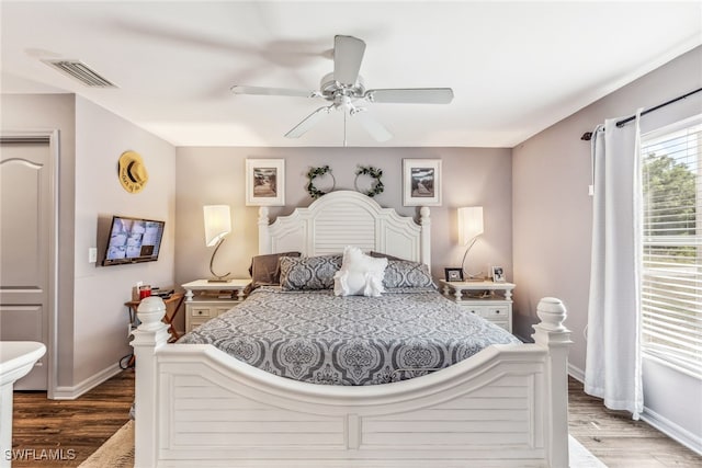 705 Columbus Blvd S, Lehigh Acres, FL 33974 - bedroom featuring wood finished floors, baseboards, and ceiling fan