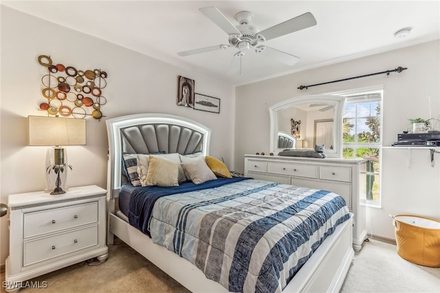 705 Columbus Blvd S, Lehigh Acres, FL 33974 - bedroom with light colored carpet and a ceiling fan