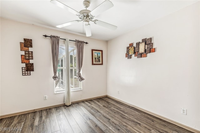 705 Columbus Blvd S, Lehigh Acres, FL 33974 - unfurnished room featuring a ceiling fan, wood finished floors, and baseboards