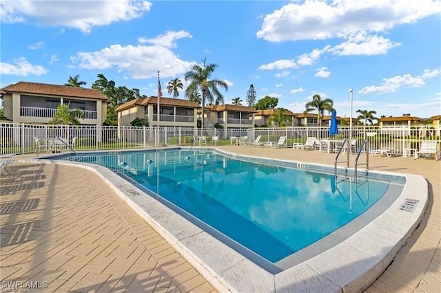 1155 Sandpiper St Unit E1, Naples, FL 34102 - community pool with a residential view