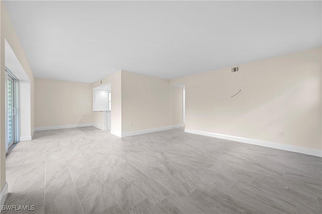 1155 Sandpiper St Unit E1, Naples, FL 34102 - empty room with baseboards