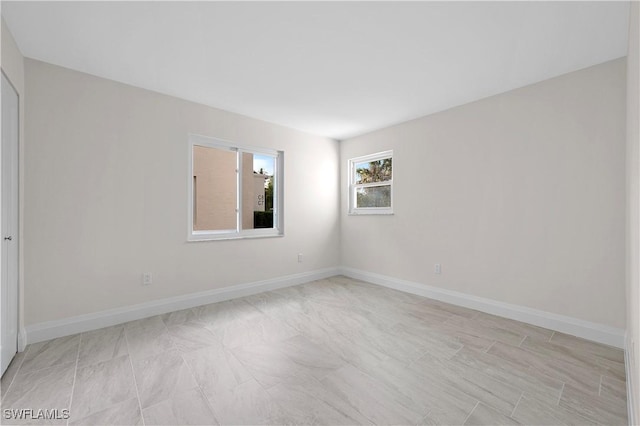 1155 Sandpiper St Unit E1, Naples, FL 34102 - unfurnished room with baseboards