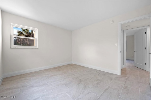 1155 Sandpiper St Unit E1, Naples, FL 34102 - empty room with baseboards