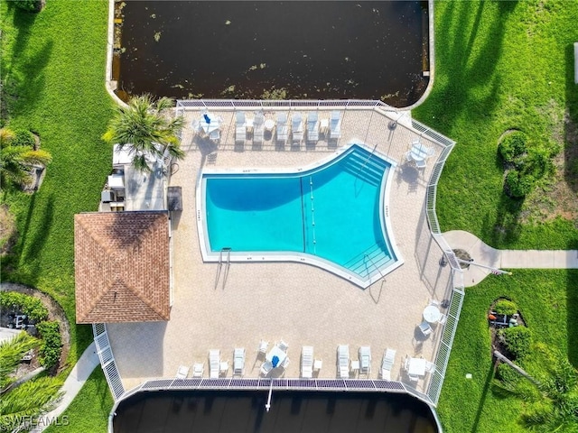 1155 Sandpiper St Unit E1, Naples, FL 34102 - view from above of property featuring a pool
