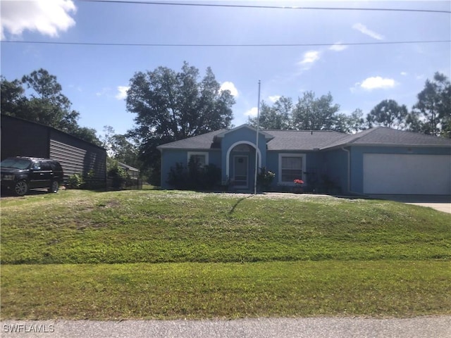 ranch-style home featuring an attached garage, driveway, a front yard, and stucco siding