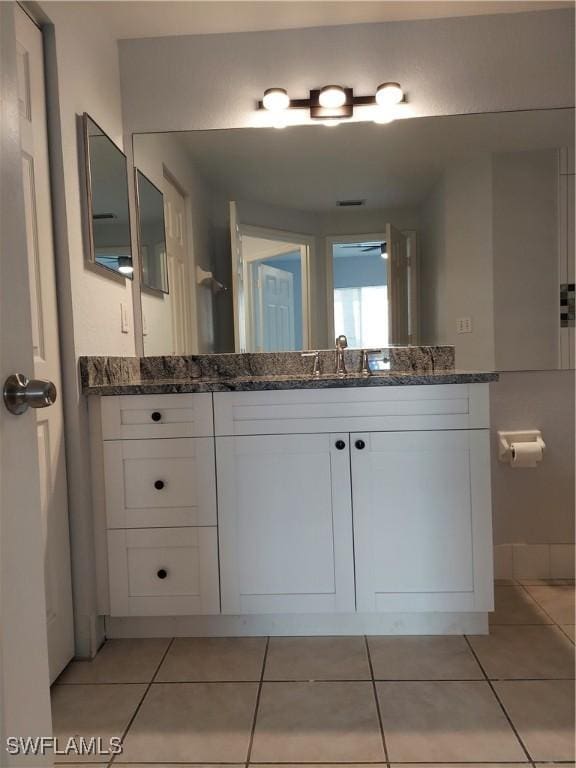 bathroom featuring vanity and tile patterned floors