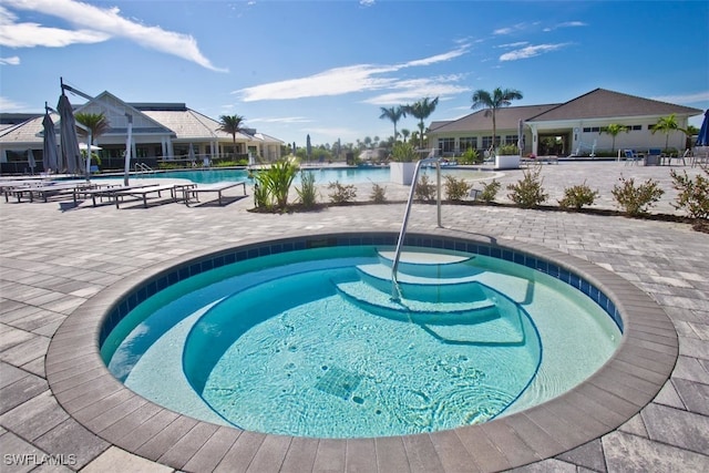 pool featuring a patio area