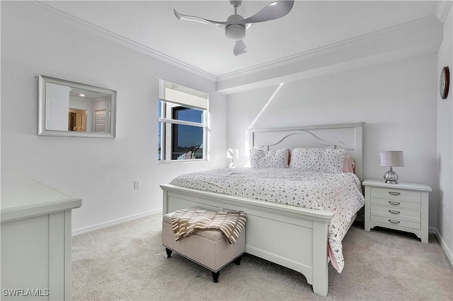 bedroom with baseboards, ornamental molding, ceiling fan, and light colored carpet