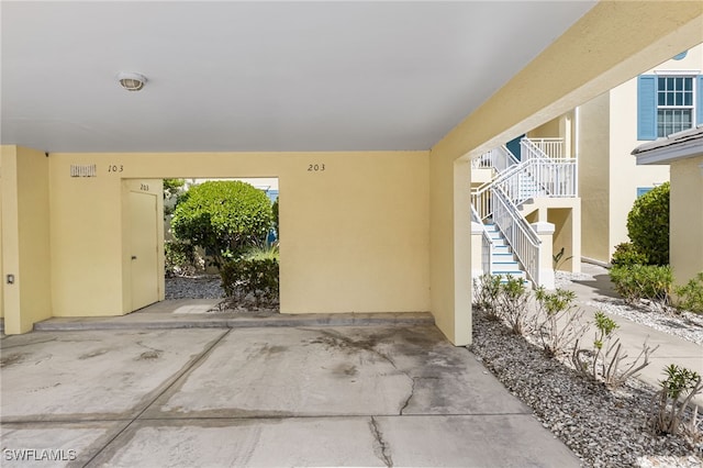14524 Abaco Lakes Dr Unit 203, Fort Myers, FL 33908 - view of patio / terrace featuring stairway