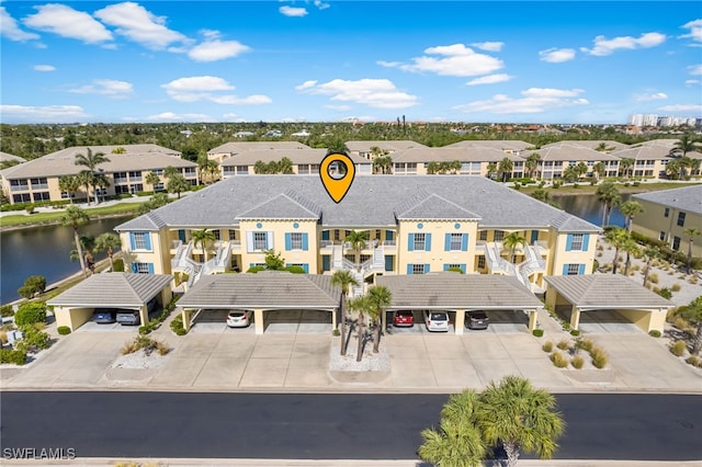 14524 Abaco Lakes Dr Unit 203, Fort Myers, FL 33908 - aerial view with a water view and a residential view