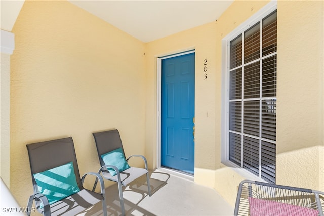 14524 Abaco Lakes Dr Unit 203, Fort Myers, FL 33908 - property entrance with stucco siding
