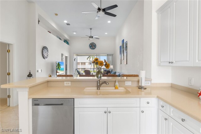 14524 Abaco Lakes Dr Unit 203, Fort Myers, FL 33908 - kitchen featuring a sink, a peninsula, dishwasher, open floor plan, and a ceiling fan