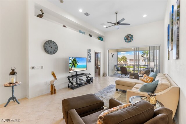 14524 Abaco Lakes Dr Unit 203, Fort Myers, FL 33908 - living room featuring a ceiling fan, recessed lighting, light tile patterned floors, visible vents, and a towering ceiling