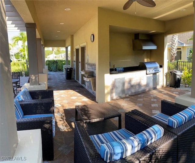 14524 Abaco Lakes Dr Unit 203, Fort Myers, FL 33908 - view of patio featuring a ceiling fan, area for grilling, fence, a grill, and an outdoor hangout area