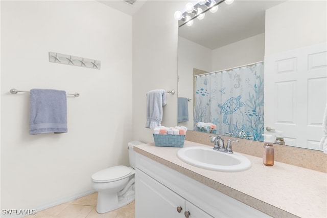 14524 Abaco Lakes Dr Unit 203, Fort Myers, FL 33908 - bathroom with toilet, tile patterned flooring, vanity, and a shower with shower curtain