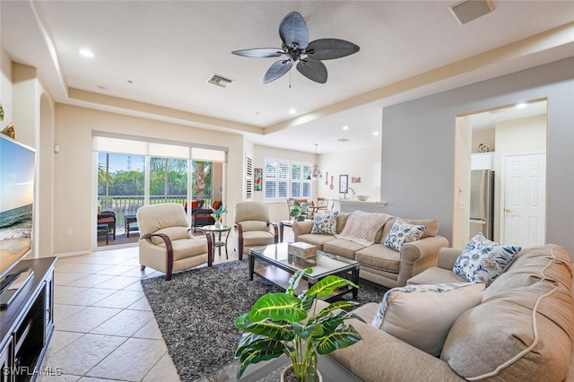 4630 Winged Foot Ct Unit 202, Naples, FL 34112 - living room with light tile patterned floors, recessed lighting, a ceiling fan, and visible vents