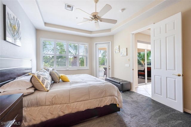 4630 Winged Foot Ct Unit 202, Naples, FL 34112 - bedroom with visible vents, carpet flooring, access to exterior, and multiple windows
