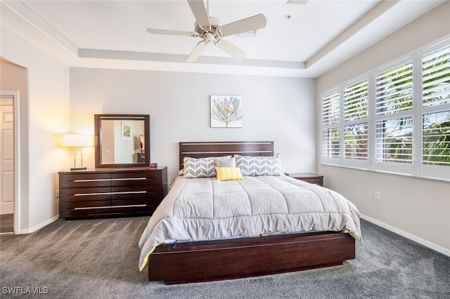 4630 Winged Foot Ct Unit 202, Naples, FL 34112 - bedroom featuring baseboards, a ceiling fan, carpet floors, and a tray ceiling