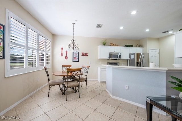 4630 Winged Foot Ct Unit 202, Naples, FL 34112 - dining area with recessed lighting, a chandelier, light tile patterned floors, visible vents, and baseboards
