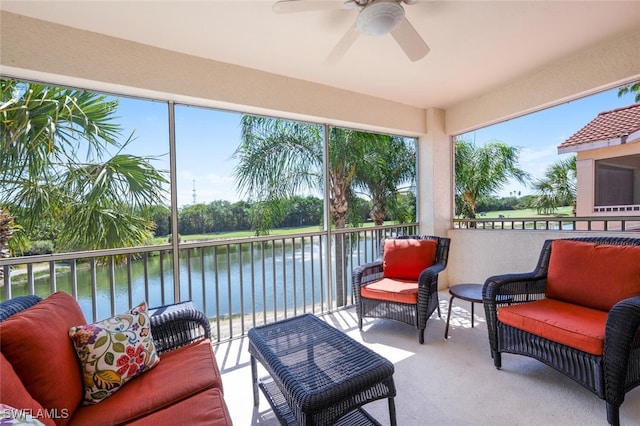 4630 Winged Foot Ct Unit 202, Naples, FL 34112 - sunroom featuring a water view and carpet floors