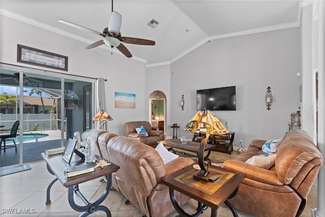 2640 SW 29th Ave, Cape Coral, FL 33914 - living area featuring vaulted ceiling, crown molding, ceiling fan, light tile patterned floors, and arched walkways