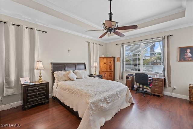 2640 SW 29th Ave, Cape Coral, FL 33914 - bedroom with wood finished floors, baseboards, ornamental molding, a raised ceiling, and a desk