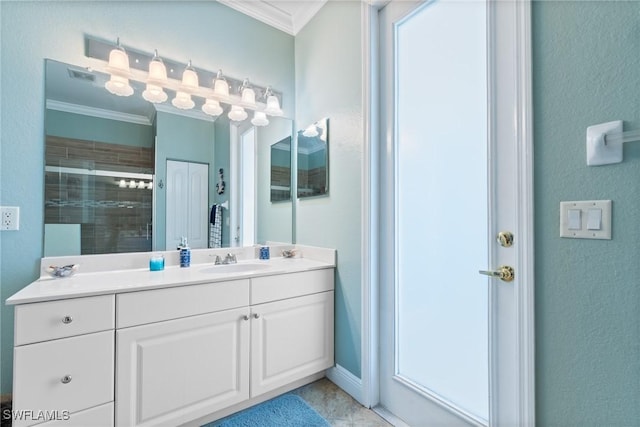 2640 SW 29th Ave, Cape Coral, FL 33914 - full bath with ornamental molding, a stall shower, vanity, and a textured wall