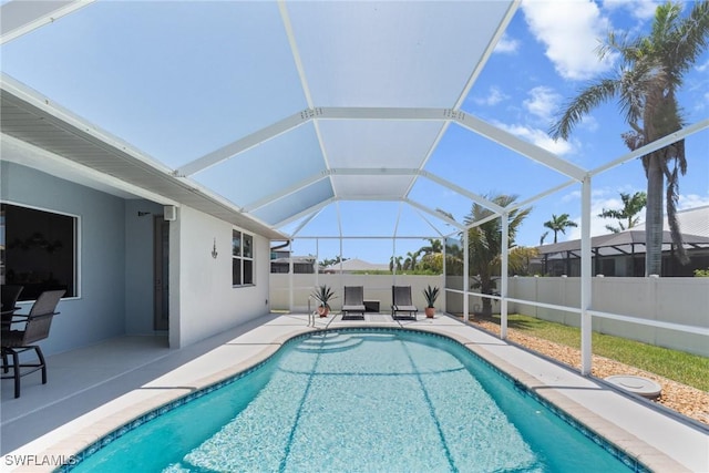 2640 SW 29th Ave, Cape Coral, FL 33914 - view of swimming pool with fence, a patio, and glass enclosure