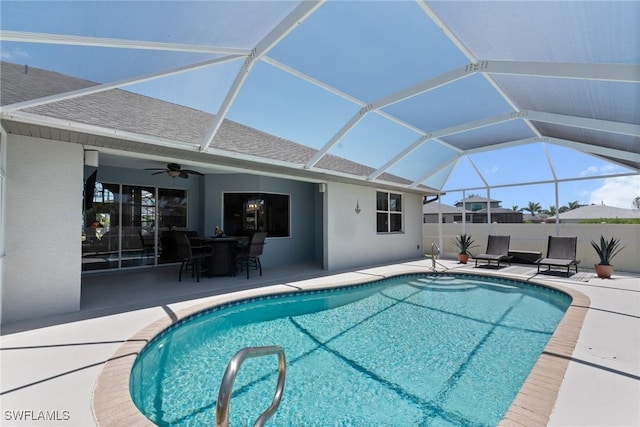 2640 SW 29th Ave, Cape Coral, FL 33914 - view of pool featuring a patio area, ceiling fan, outdoor dining area, and a lanai