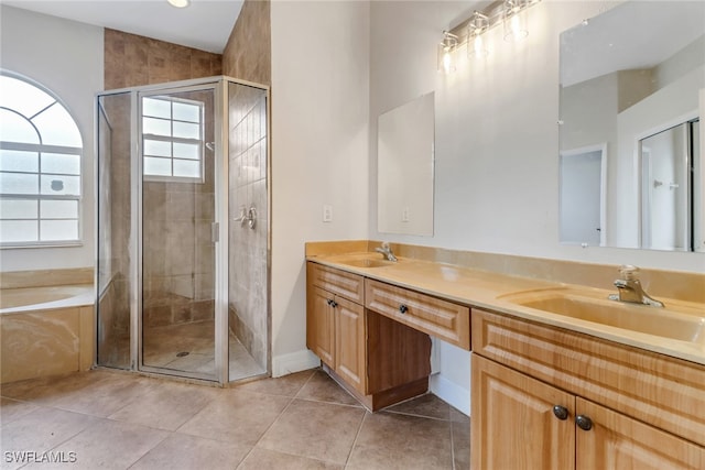 4220 12th Ave SE, Naples, FL 34117 - full bath with a shower stall, tile patterned flooring, double vanity, and a sink