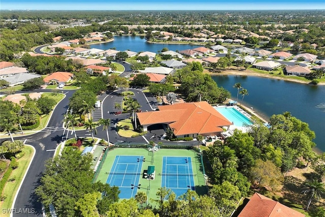 bird's eye view with a residential view and a water view
