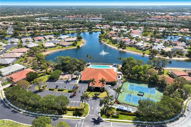 bird's eye view with a residential view and a water view