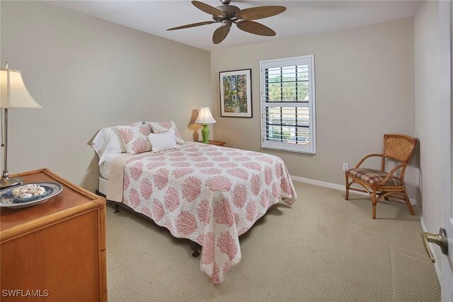 bedroom featuring baseboards, carpet flooring, and ceiling fan