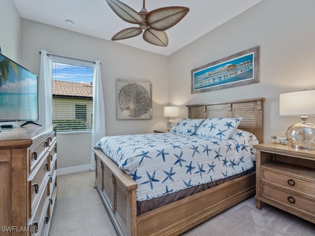 9459 Campanile Cir, Naples, FL 34114 - bedroom featuring light carpet, baseboards, and ceiling fan