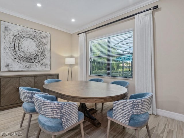 9459 Campanile Cir, Naples, FL 34114 - dining area featuring crown molding, light wood finished floors, baseboards, and recessed lighting