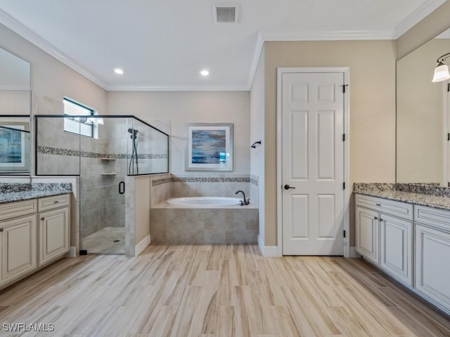 9459 Campanile Cir, Naples, FL 34114 - full bath with a bath, a shower stall, vanity, crown molding, and recessed lighting