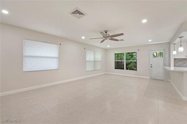 5 Rivard Rd Unit 22, Naples, FL 34112 - spare room featuring recessed lighting, ceiling fan, baseboards, and light tile patterned floors