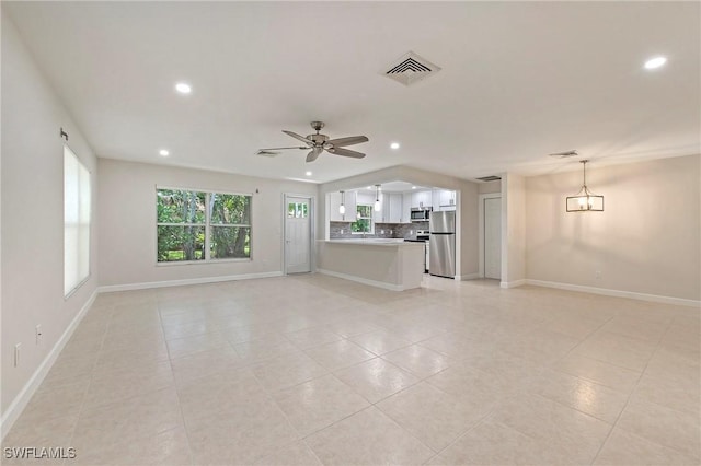 5 Rivard Rd Unit 22, Naples, FL 34112 - unfurnished living room with recessed lighting, ceiling fan, light tile patterned floors, and baseboards