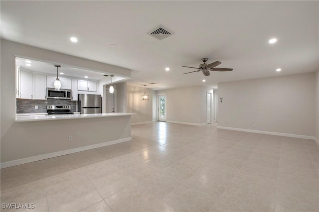5 Rivard Rd Unit 22, Naples, FL 34112 - unfurnished living room featuring recessed lighting, ceiling fan, baseboards, and light tile patterned flooring