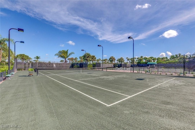 24748 Lakemont Cove Ln Unit 201, Bonita Springs, FL 34134 - view of tennis court with fence