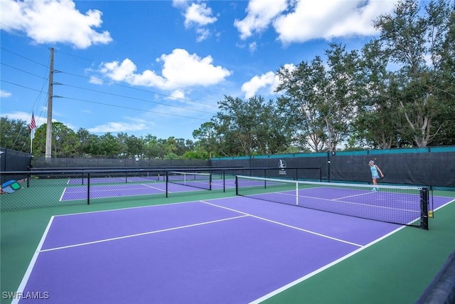 24748 Lakemont Cove Ln Unit 201, Bonita Springs, FL 34134 - view of tennis court featuring community basketball court and fence