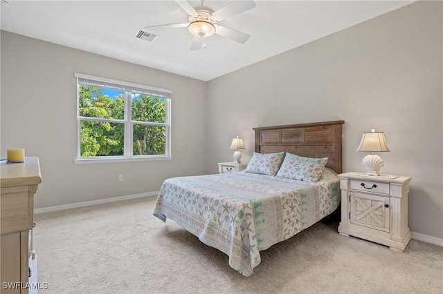 15030 Cortona Way, Fort Myers, FL 33908 - bedroom featuring light carpet, baseboards, visible vents, and ceiling fan