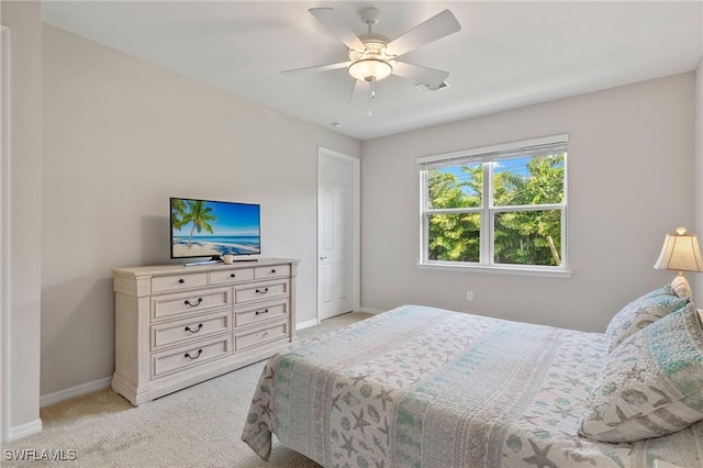 15030 Cortona Way, Fort Myers, FL 33908 - bedroom with baseboards, visible vents, light colored carpet, and ceiling fan