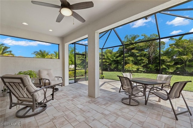 15030 Cortona Way, Fort Myers, FL 33908 - sunroom featuring outdoor dining space and ceiling fan