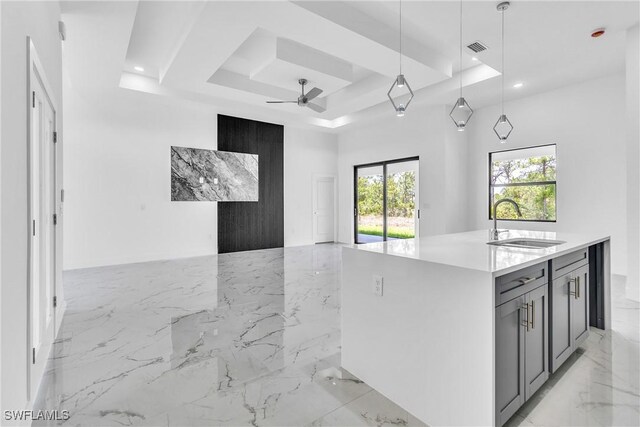 1025 Gladys St, Lehigh Acres, FL 33974 - kitchen featuring visible vents, open floor plan, marble finish floor, and a sink