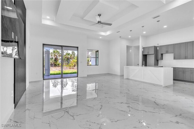 1025 Gladys St, Lehigh Acres, FL 33974 - unfurnished living room featuring recessed lighting, marble finish floor, a raised ceiling, visible vents, and ceiling fan