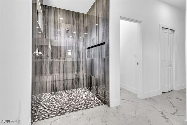 1025 Gladys St, Lehigh Acres, FL 33974 - full bathroom with baseboards, a marble finish shower, and marble finish floor