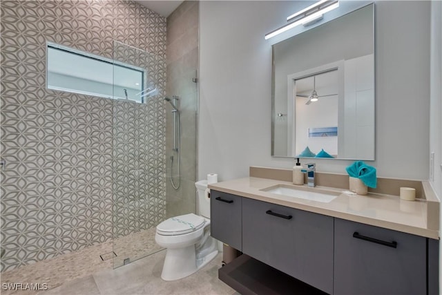 full bath featuring a walk in shower, toilet, and vanity